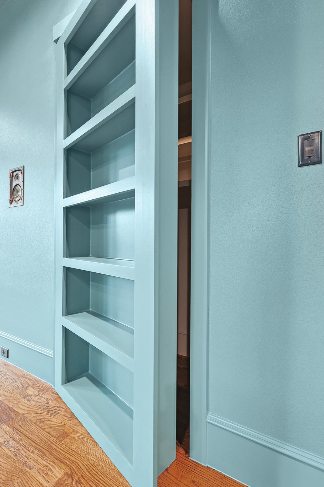 A bookshelf that opens into a hidden room
